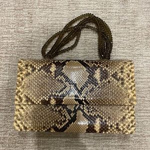 Darby Scott snakeskin handbag with beaded handle.